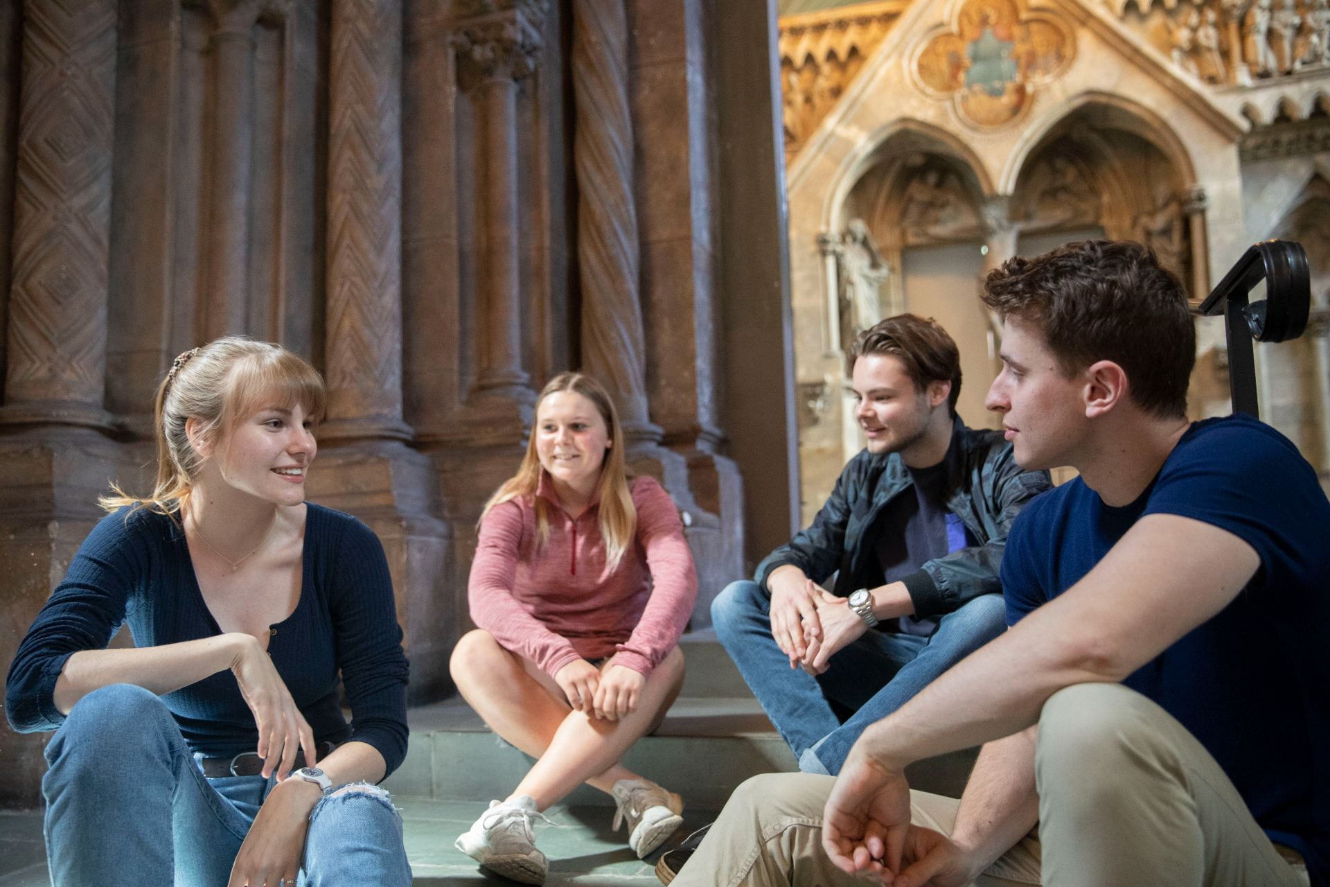 Celina Hollmichel '19, (from left) Lara Schenk '19, David Alexander '22, and Karl Oskar Schulz '22, Harvard students from Germany, speak about Angela Merkel, Chancellor of Germany who will be this year's commencement speaker. They are seen at The Minda de Gunzburg Center for European Studies (CES). Kris Snibbe/Harvard Staff Photographer